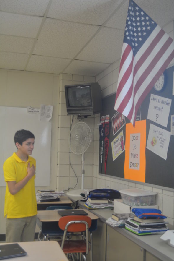 Jeremiah Mayle is pictured saying the Pledge of Allegiance at River View Junior High School. Mayle had a petition signed by students and staff to reinstate the Pledge.