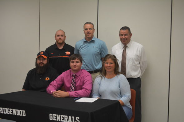 Keith Leindecker signed with Walsh University on Wednesday, May 24 at Ridgewood High School. He will be playing defensive line and specialty teams on Walsh’s football team. Beth Scott | Beacon