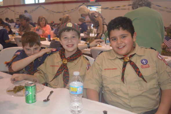 Aiden Stevens-Woolery, Anthony Cichon, and Julian Rivera enjoyed dinner at the annual Blue and Gold dinner hosted by Cub Scout Pack 403 at Sacred Heart on Saturday, Feb. 18. 