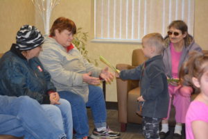 Children from Head Start handed out hand-made Christmas cards and gingerbread ornaments at the Senior Center on Tuesday, Dec. 20. In return, the seniors gave them items to use in their classroom. Beth Scott | Beacon