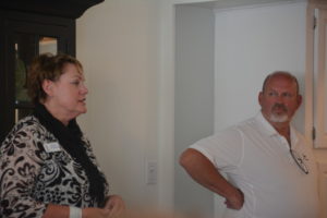 America in Bloom Judge Leslie Pittenger shares thoughts on her time in Coshocton during the community reception for herself and fellow judge Linda Cromer. Listening at right is Tim France, president of Coshocton is Blooming. Josie Sellers | Beacon