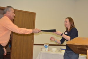 Coshocton County Commissioner Gary Fischer presented Emily Adams from the OSU Extension Coshocton County Office with a proclamation for the National Ag Day celebration in Coshocton County. Josie Sellers | Beacon