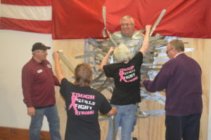 Dave Rogers at Annin kept a smile on his face through most of his time being duct taped to a plywood wall and having whipped cream pies thrown at him by employees. This was the company’s unique way of raising money for United Way of Coshocton County.  Josie Sellers | Beacon