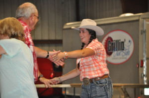 The first ever Celebrity Hoedown was held in Hunter Arena at the Coshocton County Fairgrounds on Friday evening, July 8. Jacque Woodward is pictured enjoying the square dancing. Mark Fortune | Beacon