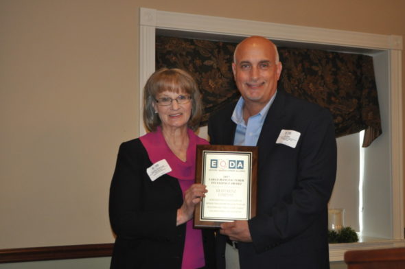 Kurt Bain, Kraft Heinz Company Coshocton plant manager, is pictured with Dorothy Skowrunski, Coshocton Port Authority Executive Director, with the large manufacturer excellence award that was presented to Kraft Heinz at the 2017 Eastern Ohio Development Alliance annual meeting on Friday, April 28. The meeting was held at the Carlisle Inn in Walnut Creek. 