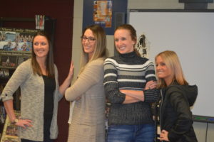 Ashley Owen Conidi, Brittany Bailey, Kristin Daugherty Ronai, and Sami Dickerson Chrisman recreated the pose from their senior basketball season picture during a reunion organized for River View High School’s 2006 and 2007 Division II Girls State Championship teams. Josie Sellers | Beacon