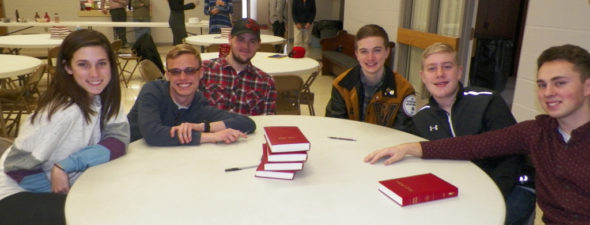 A group of friends wait for the youth rally to begin at Roscoe UMC on March 19. Jen Jones | Beacon