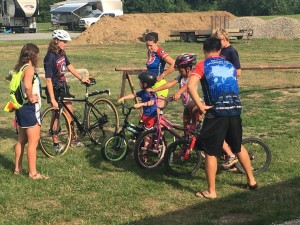 Children learn about the various parts of a bicycle during a safety presentation put on by Bike and Build at Colonial Campground on Thursday, July 7. Andrew Everhart | Beacon