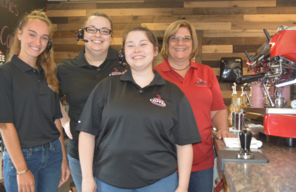 Coshocton Coffee Connection at 750 S. Second St. recently opened to the public. Pictured from left are three of the coffee shop’s employees Cassidi Bookless, Heather Adkins and Dianna Rivera with manager Donna LaFollette. Josie Sellers | Beacon