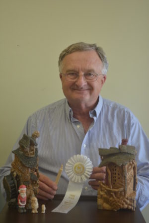 Tim Jackson has been creating woodcarvings for 13 years and recently earned a third place ribbon at the Dayton Carvers Guild for a half inch Santa Claus that he created. Josie Sellers | Beacon