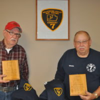 Two long serving firemen honored