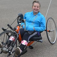 Resident with spina bifida receives new adapted bike