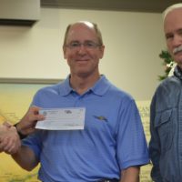 Rotary Club presents checks